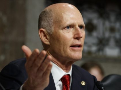 In this Feb. 29, 2019, file photo, Senate Armed Services Committee member Sen. Rick Scott (R-FL) speaks during a hearing on Capitol Hill in Washington. Scott invited Hong Kong democracy activist Nathan Law to the State of the Union address on Tuesday, Feb. 4, 2020. The guests of Florida's two …