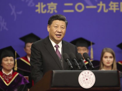 Chinese President Xi Jinping gives a speech during the Tsinghua Universitys ceremony for R