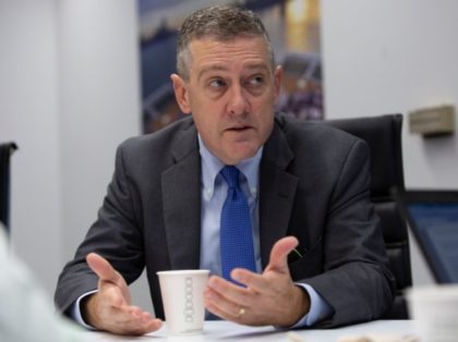 President and CEO of the Federal Reserve Bank of St. Louis James Bullard speaks during an interview with AFP in Washington, DC, on August 6, 2019. - The Federal Reserve has set US interest rates "in the right neighborhood," but will watch how the economy reacts to factors like the …