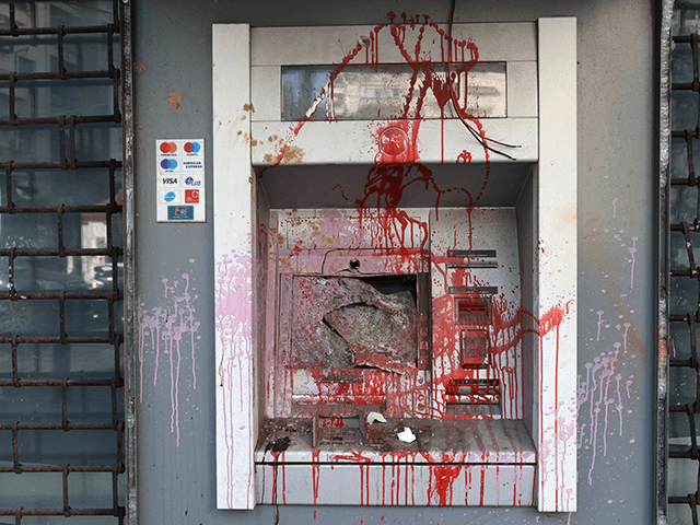 A picture shows the vandalised ATM of a bank in the Lebanese capital Beirut on February 18