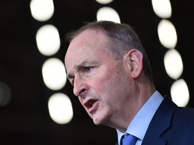 Ireland's Prime Minister Micheal Martin speaks to press as he arrives for an emergency Eur
