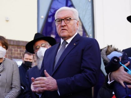 BERLIN, GERMANY - MARCH 07: German President Frank-Walter Steinmeier (C) speaks to media next to his wife Elke Buedenbender (3rdL) during a visit to refugee children from a Jewish community from Odessa at the Jewish education center Chabad on March 7, 2022 in Berlin, Germany. German President Frank-Walter Steinmeier met …