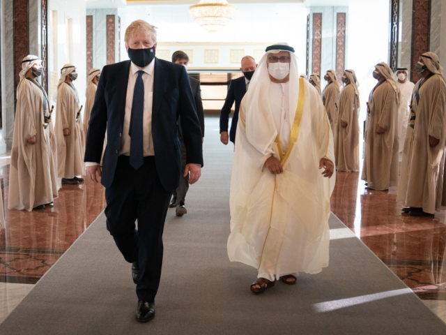 ABU DHABI, UNITED ARAB EMIRATES - MARCH 16: Prime Minister Boris Johnson inspects the Guar