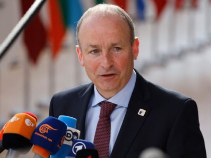 Ireland's Prime Minister Micheal Martin talks to the press as he arrives for the second day of a European Union (EU) summit at the EU Headquarters, in Brussels on March 25, 2022. (Photo by Ludovic MARIN / AFP) (Photo by LUDOVIC MARIN/AFP via Getty Images)