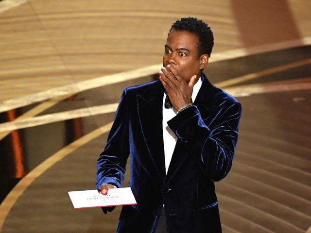 US actor Chris Rock speaks onstage during the 94th Oscars at the Dolby Theatre in Hollywoo