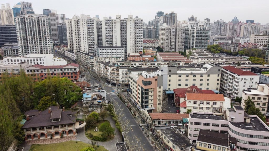 An aerial view of a residential area is seen during the second stage of a pandemic lockdown in Jing' an district in Shanghai on April 5, 2022. (Photo by Hector RETAMAL / AFP) (Photo by HECTOR RETAMAL/AFP via Getty Images)