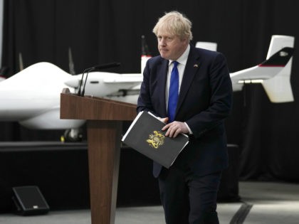 DOVER, ENGLAND - APRIL 14: Prime Minister Boris Johnson leaves after delivering a speech at Lydd Airport on April 14, 2022 in Dover, England. The UK government announced that they will process people seeking asylum in Britain 4,500 miles away in Rwanda in an effort to crack down on unauthorised …