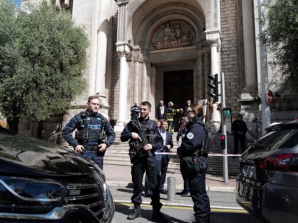 Police officers stand guard outside Saint-Pierre d'Arene church following the attack of a priest by a man with "obvious bipolar disorder" in the French riviera city of Nice, on April 24, 2022. (Photo by Valery HACHE / AFP) (Photo by VALERY HACHE/AFP via Getty Images)