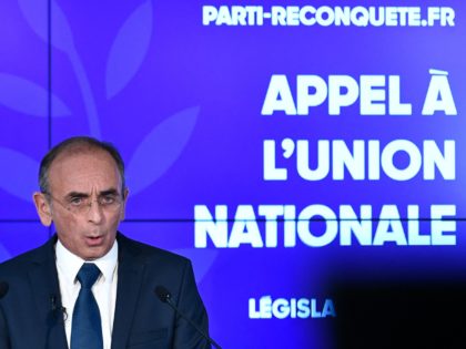 French far-right party Reconquete! presidential candidate Eric Zemmour delivers a speech after France's presidential election were announced in Paris on April 24, 2022. - French President Emmanuel Macron was on course to win a second term by defeating far-right leader Marine Le Pen in presidential elections, projections showed. Macron was …