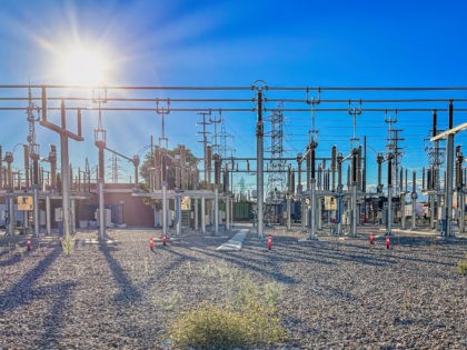 electricity transformation centre, power station, electricity distribution point, electricity network, sunset sun rays, horizontal