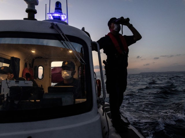 VAN, TURKEY - SEPTEMBER 29: Members of the Turkish Coast Guard search for boats carrying r