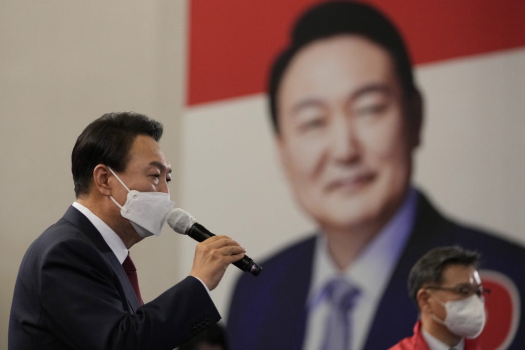 SEOUL, SOUTH KOREA - MARCH 10: South Korean President-elect Yoon Suk-yeol of the main opposition People Power Party celebrates with party members and lawmakers at the National Assembly on March 10, 2022 in Seoul, South Korea. Main opposition candidate Yoon Suk-yeol was elected South Korea's next president. (Photo by Lee Jin-Man - Pool/Getty Images)