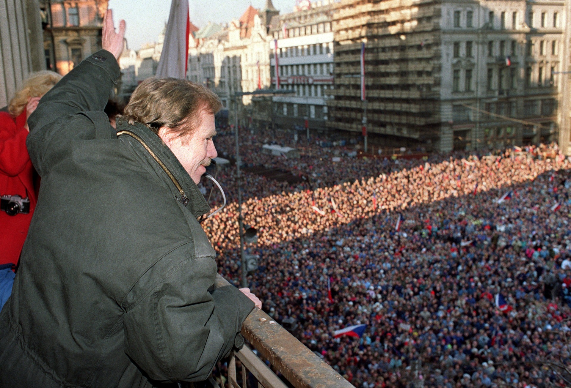 Vaclav Havel, a dissident playwright and leading member of the Czechoslovak opposition Civic Forum, who drafted large parts of Charter 77, the declaration which helped attract international attention to the civil rights abuses in Czechoslovakia, waves 10 December 1989 to the crowd of thousands of demonstrators gathered on Prague's Wenceslas Square, celebrating the communist capitulation and nomination of the new government formed by Marian Calfa from Slovak dissident movement the Public Against Violence. At the end of 1989, Havel was elected first president of the then Czechoslovakia when the state-communist system crumbled in the Velvet Revolution. LUBOMIR KOTEK/AFP via Getty Images