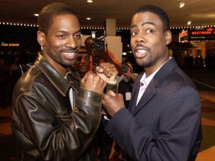 WESTWOOD, CA - MARCH 26: Actor/comedian Chris Rock (R) and his brother Tony attend the premiere of the DreamWorks film "Head of State" on March 26, 2003 in Westwood, California. (Photo by Vince Bucci/Getty Images)