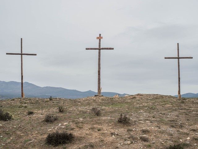 Three crosses are seen after neighbours of Hiendelaencia performed the reenactment of Chri