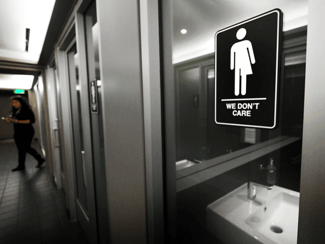 DURHAM, NC - MAY 10: Gender neutral signs are posted in the 21C Museum Hotel public restro