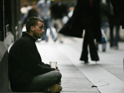 GLASGOW, UNITED KINGDOM - OCTOBER 05: A homeless man begs for small change on the streets, on October 5, 2005 in Glasgow, Scotland. UK Homeless charity Shelter figures show that 85,286 people applied as homeless in Scotland in 2003/4, with 26,584 of them being children. (Photo by Christopher Furlong/Getty Images)