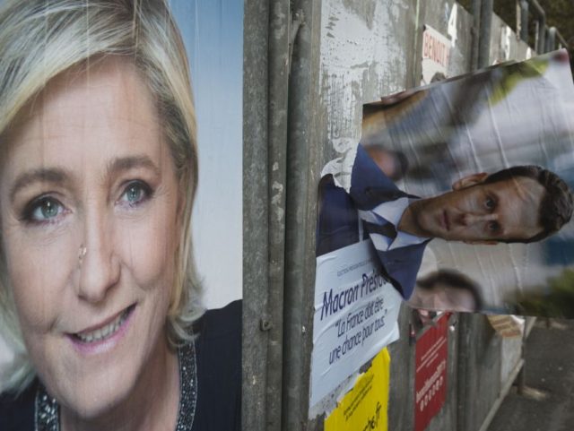 A picture taken on April 24, 2017 in Henin-Beaumont, northern France, shows campaign poste