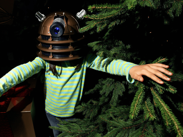 A child plays with a 'Doctor Who' Dalek Voice Changer at the Hamleys Christmas toy photocall in London, on July 15, 2008. Hamleys unveiled on Tuesday the 'must have' toys for Christmas 2008.AFP PHOTO/Leon Neal (Photo credit should read Leon Neal/AFP via Getty Images)