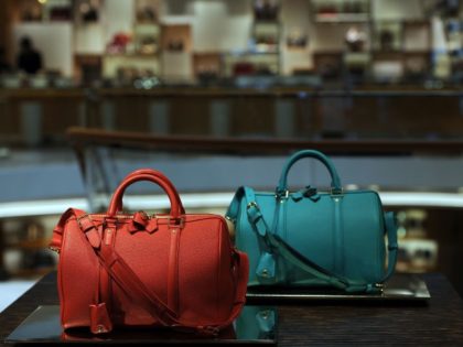 Handbags are displayed in a Louis Vuitton shop on its opening day on January 27, 2012 in Rome.