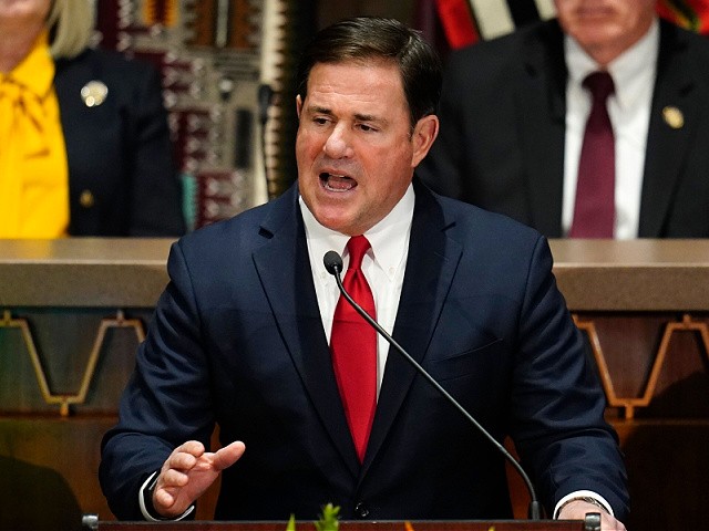 FILE — Arizona Republican Gov. Doug Ducey gives his state of the state address at the Arizona Capitol, Monday, Jan. 10, 2022, in Phoenix. Governor Ducey signed a series of bills Wednesday, March 30, targeting abortion and transgender rights, joining a growing list of GOP-led states pursuing a conservative social agenda. (AP Photo/Ross D. Franklin, File)