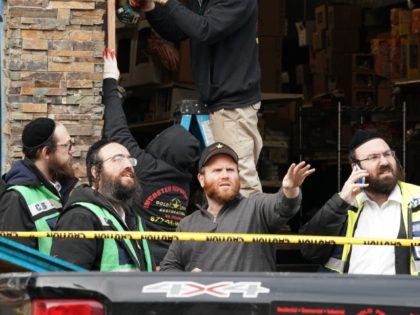 A demolition and recovery crew works at the scene of the December 10, 2019 shooting at a Jewish Deli on December 11, 2019 in Jersey City, New Jersey. - The shooters who unleashed a deadly firefight in Jersey City deliberately targeted a kosher grocery, the city's mayor said December 11, …