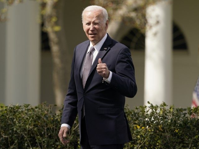 President Joe Biden pauses to answer a question from a reporter after he spoke about stren
