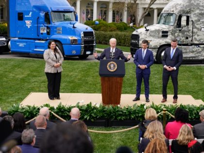 President Joe Biden speaks about strengthening the supply chain with improvements in the trucking industry, on the South Lawn of the White House in Washington, Monday, April 4, 2022, as from left, driver Maria Rodriguez, Transportation Secretary Pete Buttigieg and former Rep. Patrick Murphy, chair of the Veterans Trucking Task …