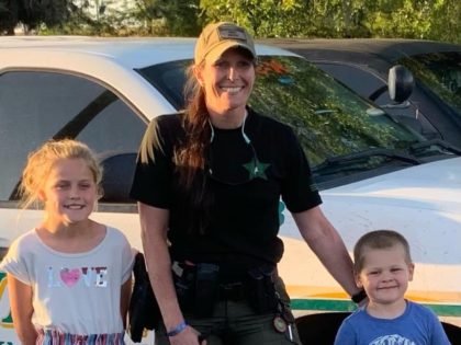 K-9 Deputy Beth Smith with two brave children