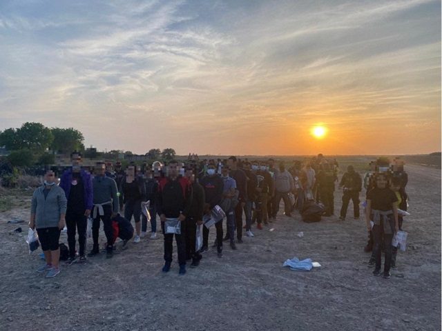 Rio Grande Valley Sector Border Patrol agents apprehend a large group of migrants near Rom