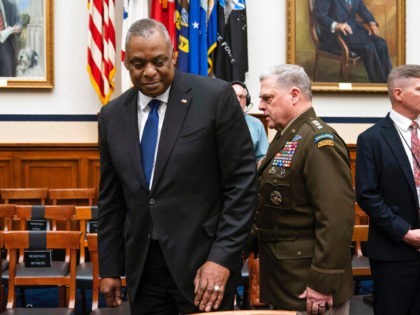 Secretary of Defense Lloyd Austin and Chairman of the Joint Chiefs of Staff Gen. Mark Milley arrive for a House Armed Services Committee hearing on the fiscal year 2023 defense budget, Tuesday, April 5, 2022, in Washington. (AP Photo/Evan Vucci)