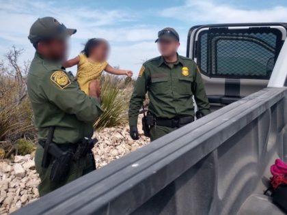 Sanderson Station agents rescue two infants with a group of migrants abandoned by human smugglers in the desert. (U.S. Border Patrol/Big Bend Sector)