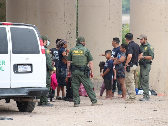 Border Patrol agents process a group of migrants who crossed the border near Eagle Pass, Texas. (Randy Clark/Breitbart Texas))