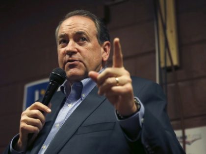 In this Jan. 31, 2016, photo, former Republican presidential candidate and former Arkansas Gov. Mike Huckabee speaks at Inspired Grounds Cafe in West Des Moines, Iowa. Huckabee has resigned from the board for the Country Music Association Foundation after his election was swiftly criticized in the music community. On Wednesday, …