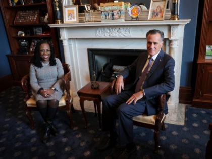 WASHINGTON, DC - MARCH 29: U.S. Sen. Mitt Romney (R-UT) (R) meets with U.S. Supreme Court nominee Ketanji Brown Jackson (L) on Capitol Hill March 29, 2022 in Washington, DC. Supreme Court nominee Ketanji Brown Jackson continued to meet with Senate members on Capitol Hill ahead of her confirmation vote. …