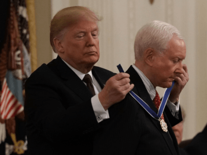 WASHINGTON, DC - NOVEMBER 16: U.S. President Donald Trump (L) presents the Presidential Medal of Freedom to Sen. Orrin Hatch (R-UT) (R) during an East Room ceremony November 16, 2018 in Washington, DC. The award is the the nation's highest civilian honor that present to individuals who have made significant …