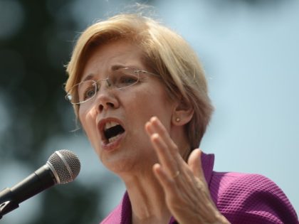 WASHINGTON, DC - JUNE 21: U.S. Sen. Elizabeth Warren (D-MA) speaks at a rally to oppose the repeal of the Affordable Care Act and its replacement on Capitol Hill on June 21, 2017, in Washington, DC. Criticism is mounting on the GOP for health care reform legislation being done behind …