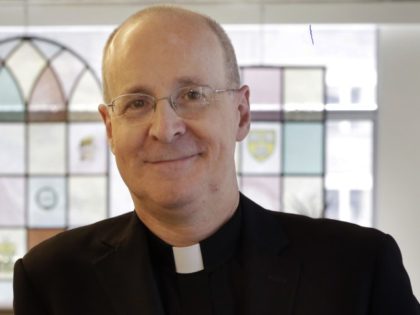 Father James Martin, a Jesuit priest and editor at large of America Magazine, poses for photos at the publication's offices, in New York, Monday, May 21, 2018. Pope Francis' reported comments to a gay man that "God made you like this" have been embraced by the LGBT community as another …