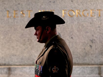 SYDNEY, AUSTRALIA - APRIL 25: A Defence person stands next to the Cenotaph during the Sydney Dawn Service on April 25, 2022 in Sydney, Australia. Anzac day is a national holiday in Australia, traditionally marked by a dawn service held during the time of the original Gallipoli landing and commemorated …