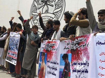 Afghans chant slogans against Iran during a demonstration in in Massoud Square, Kabul, Afg