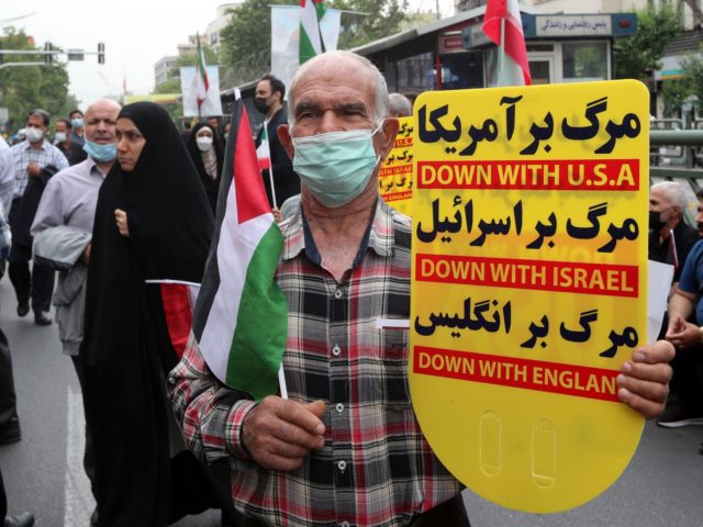 ranians march during a rally marking al-Quds (Jerusalem) day in the capital Tehran, on Apr