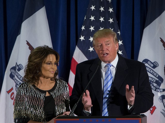 AMES, IA - JANUARY 19: Republican presidential candidate Donald Trump speaks as former Alaska Gov. Sarah Palin looks on at Hansen Agriculture Student Learning Center at Iowa State University on January 19, 2016 in Ames, IA. Trump received the endorsement of former Alaska Gov. Sarah Palin. (Photo by Aaron P. Bernstein/Getty Images)