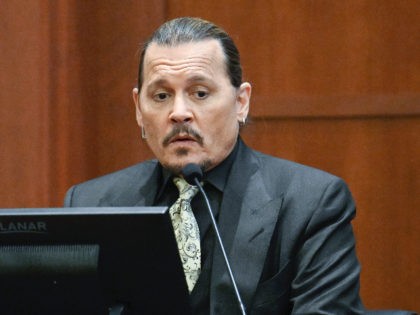 Actor Johnny Depp testifies during a hearing at the Fairfax County Circuit Court in Fairfa