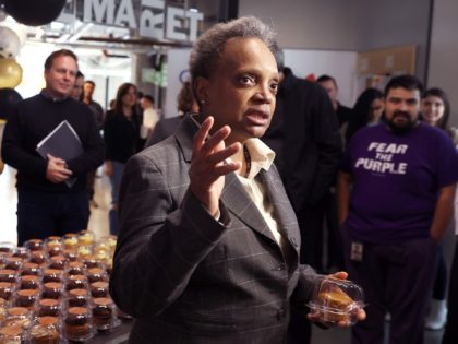 CHICAGO, ILLINOIS - APRIL 05: Chicago Mayor Lori Lightfoot greets employees returning to work at the Chicago Google offices on April 05, 2022 in Chicago, Illinois. Google employees began returning to work in the office this week for three days a week following a two-year hiatus caused by the COVID-19 …