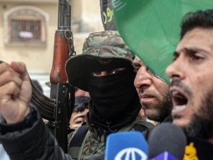 Members of the Islamic Jihad militant group take part in a rally alongside Hamas supporters after Friday prayers in Khan Yunis The Southern Gaza Strip, on April 8, 2022, to express support of the Al-Aqsa mosque, the Tel Aviv attacker, and three Islamic Jihad militants killed by Israeli security forces …