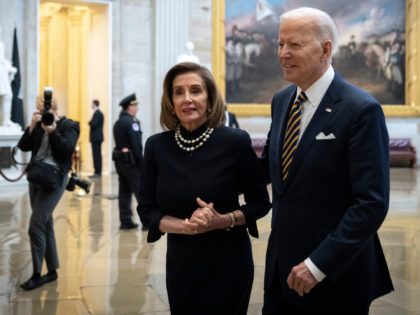 WASHINGTON, DC - MARCH 29: (L-R) Speaker of the House Nancy Pelosi greets President Joe Biden in the Rotunda as he arrives to pay his respects to the late Rep. Don Young (R-AK) while lying in state in Statuary Hall at the U.S. Capitol March 29, 2022 in Washington, DC. …