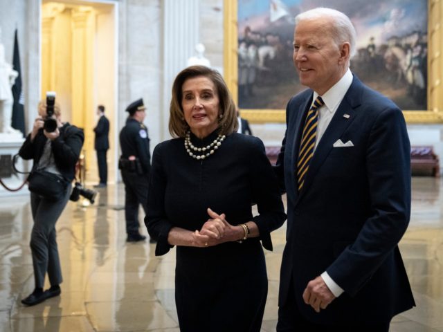 WASHINGTON, DC - MARCH 29: (L-R) Speaker of the House Nancy Pelosi greets President Joe Bi