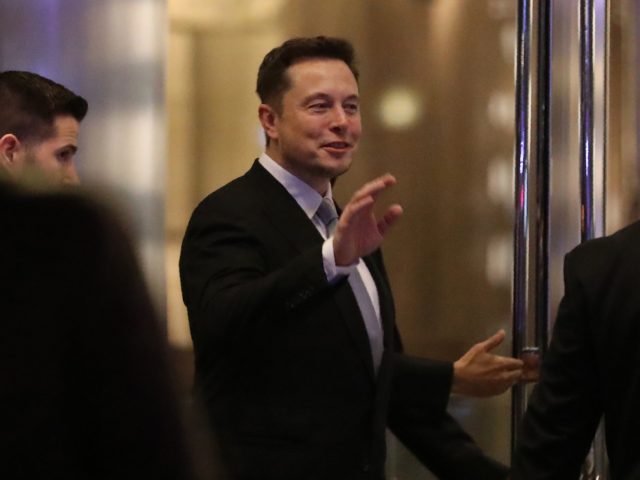 Elon Musk, the co-founder and chief executive of Electric carmaker Tesla, gestures during a ceremony in Dubai on February 13, 2017. Tesla announced the opening of a new Gulf headquarters in Dubai, aiming to conquer an oil-rich region better known for gas guzzlers than environmentally friendly motoring. / AFP PHOTO …