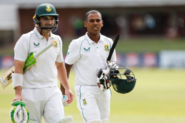 South Africa's Dean Elgar (L) and South Africa's Keegan Petersen (R)