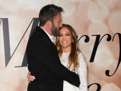 US actress Jennifer Lopez and actor Ben Affleck, seen at a special screening of "Marry Me" at the Directors Guild of America (DGA) in Los Angeles on February 8, 2022, are engaged